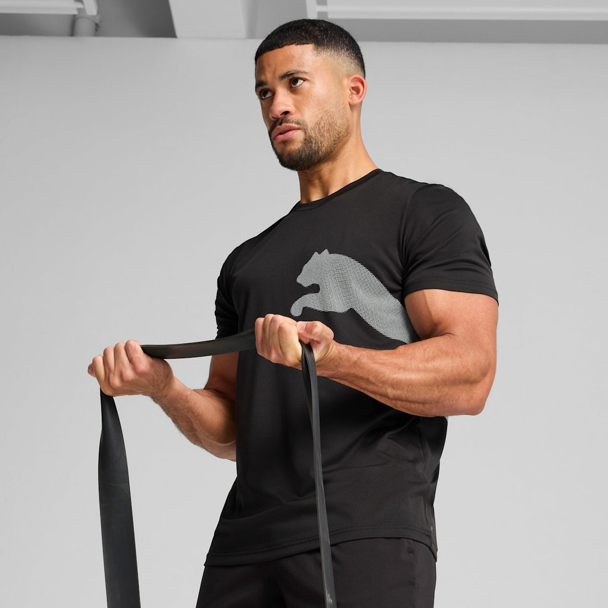 Train All Day Big Logo Tee Men - PUMA Black model image