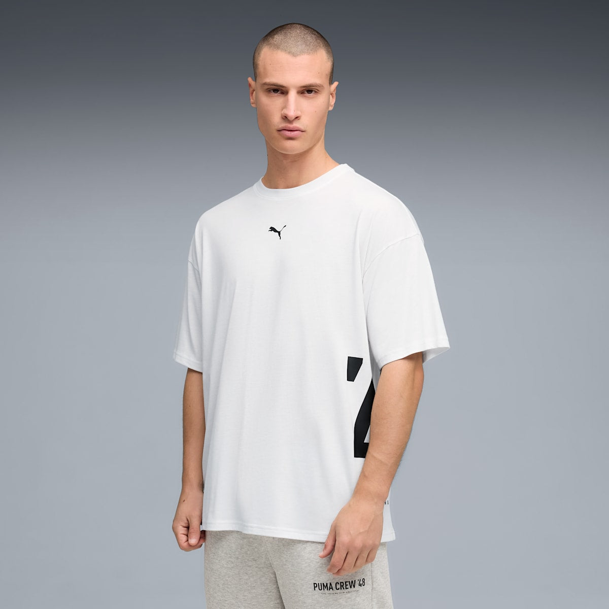 Graphics Training Tee Oversized Men - PUMA White model image