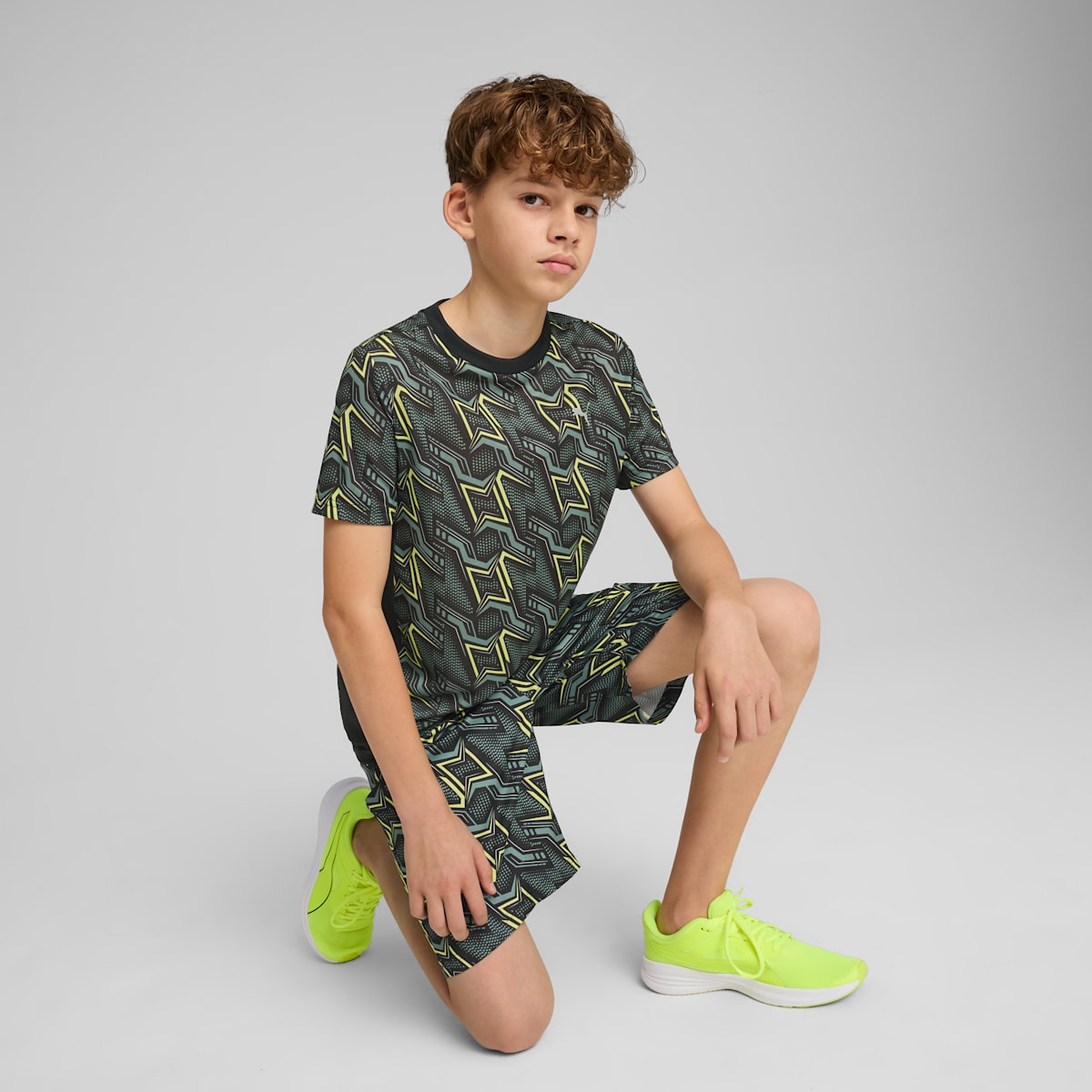 TAD ESS AOP Poly Tee B PUMA Black model image