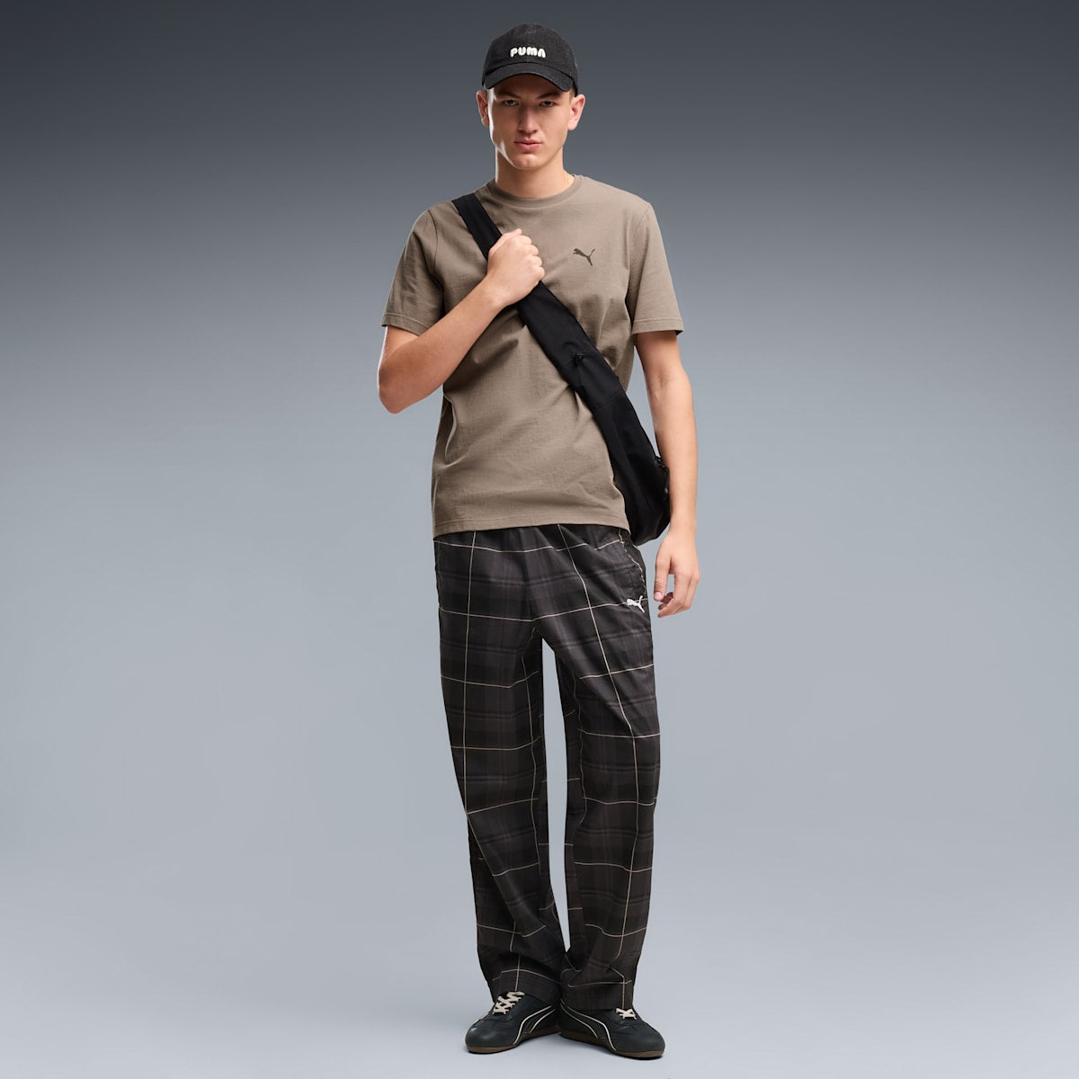 T7 Relaxed Tartan Track Pants Men - PUMA Black - on model