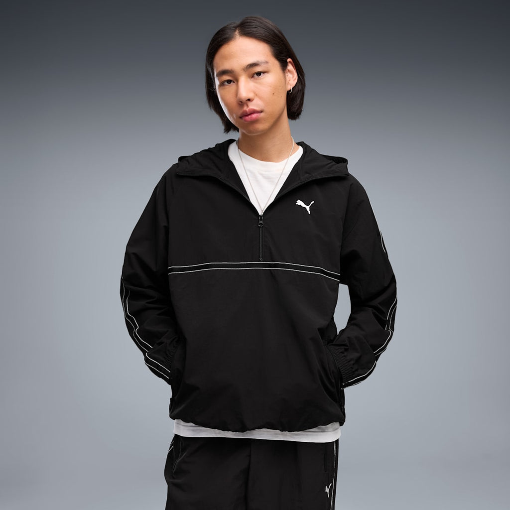 PUMA Class Men's Relaxed Pinnacle Half-Zip Hoodie - PUMA Black - on model