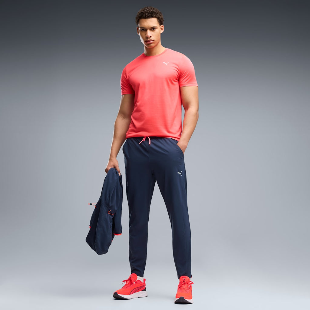 PWRTRAIN Stretch Woven Pants Men - PUMA Navy - on model