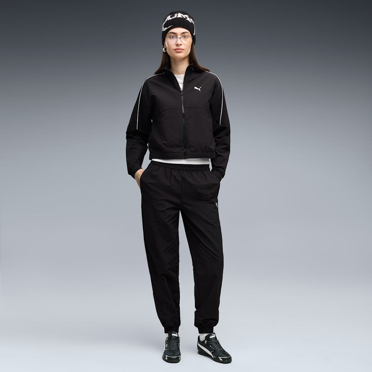 PUMA Women's Clothing TRACKSUIT SET - PUMA Black - on model