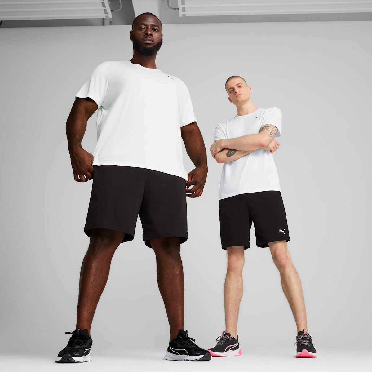 TAD ESSENTIALS 8" Knit Shorts Men - PUMA Black - on model