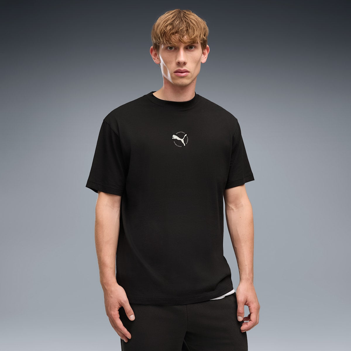PUMA Sport Relaxed Graphic Tee Men - PUMA Black - on model