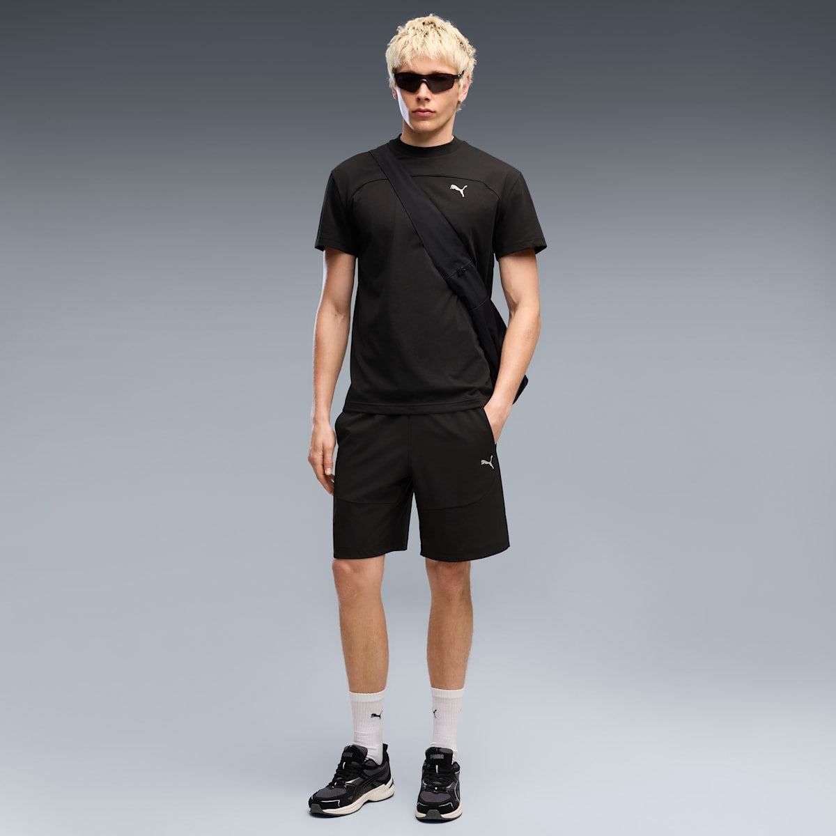 PUMATECH Men's 4-Way Stretch Cargo Shorts - PUMA Black - on model