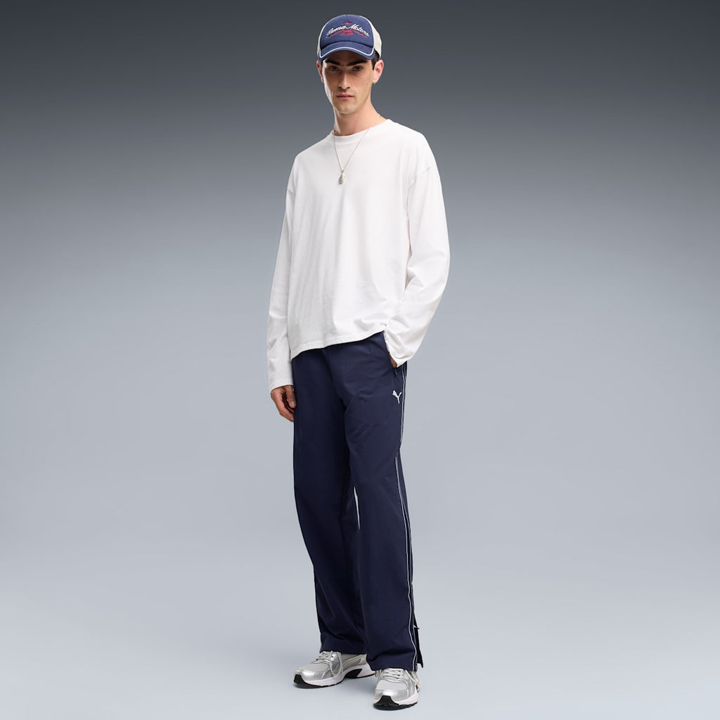 PUMA Class Relaxed Pinnacle Woven Track Pants Men - PUMA Navy - on model