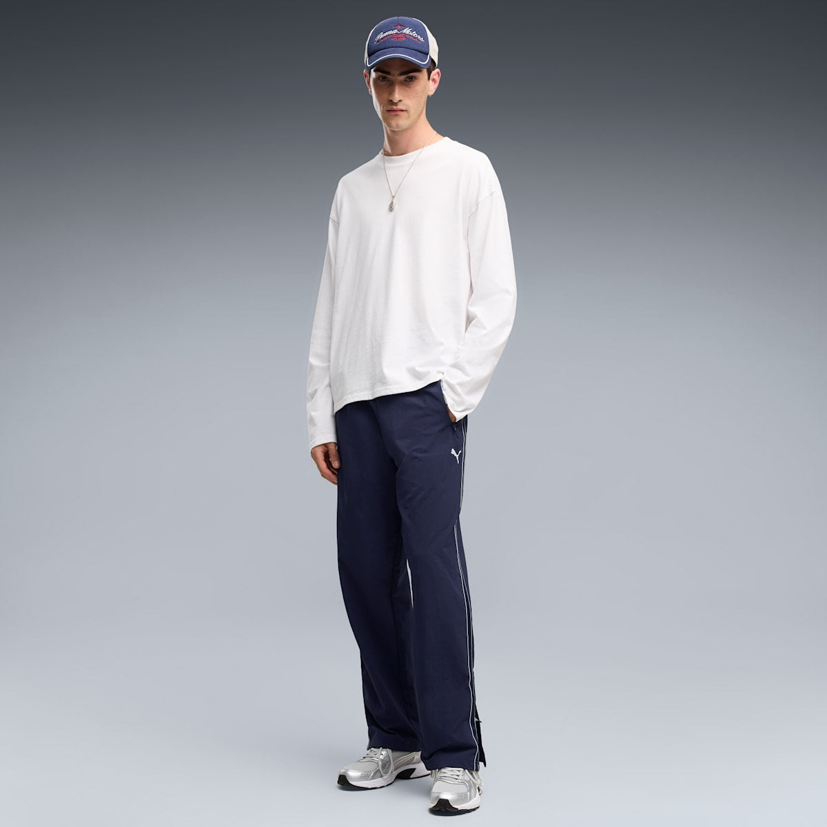 PUMA Class Relaxed Pinnacle Woven Track Pants Men - PUMA Navy - on model
