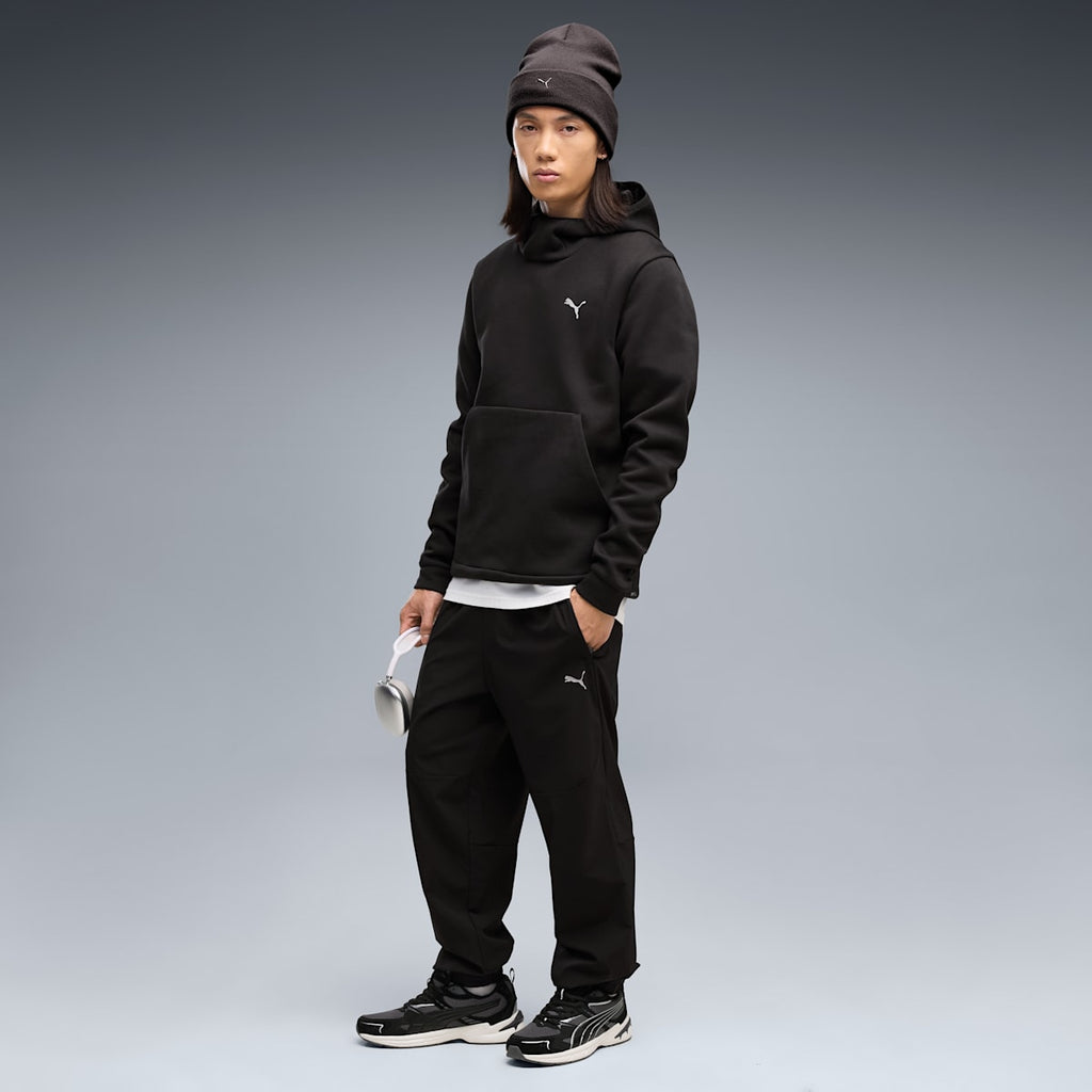 PUMATECH 4-Way Stretch Men's Woven Pants - PUMA Black - on model