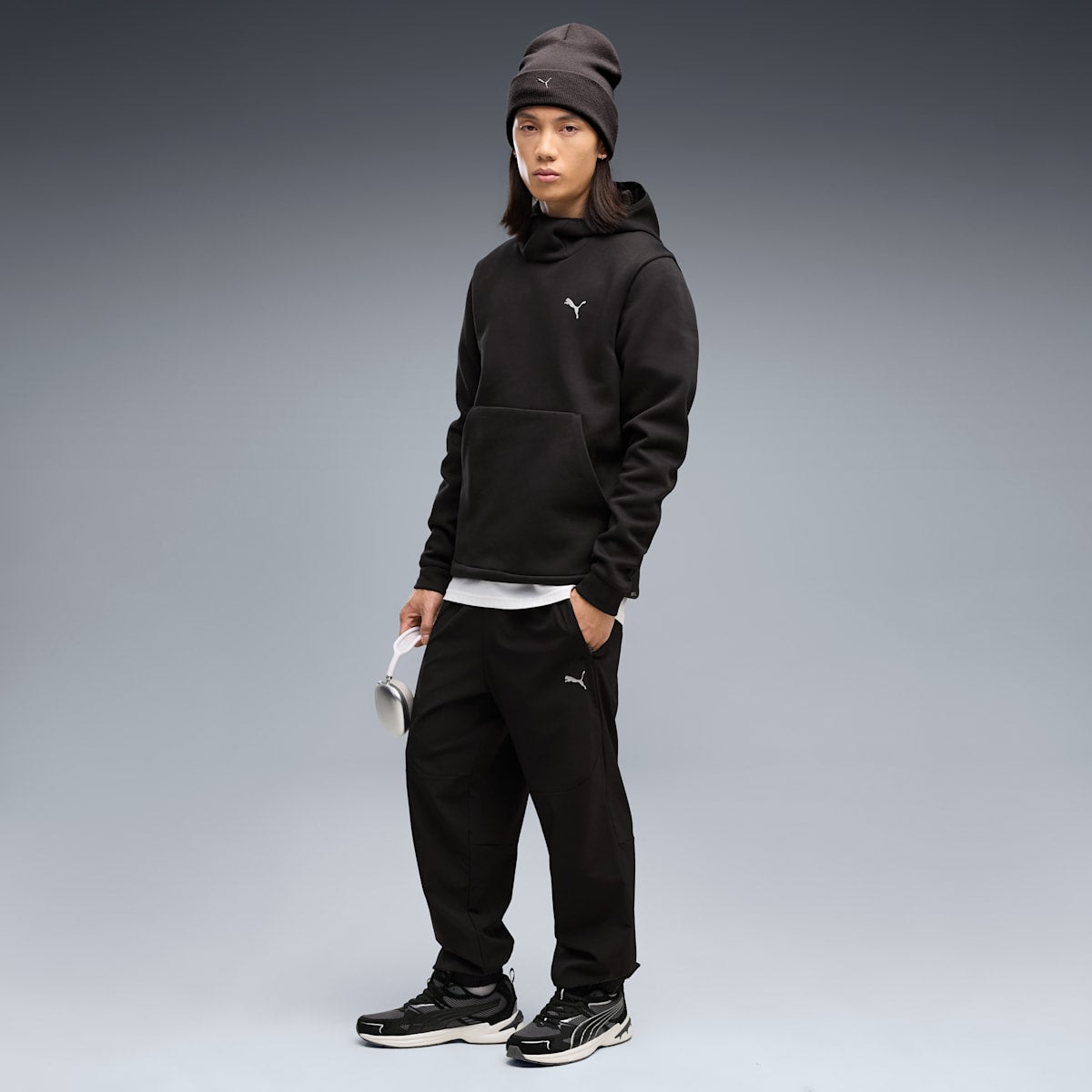 PUMATECH 4-Way Stretch Men's Woven Pants - PUMA Black - on model