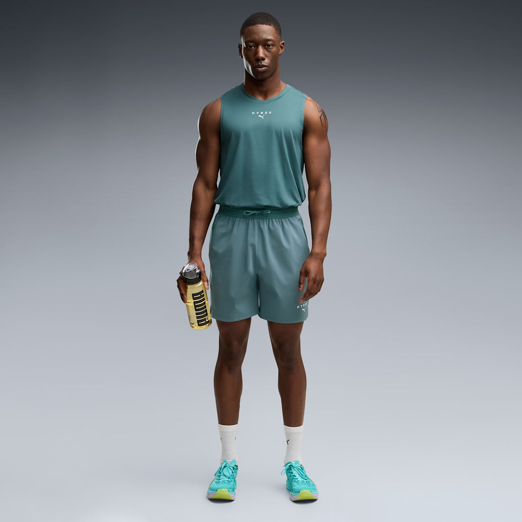 PUMA x HYROX PWRTRAIN 7" Shorts Men - Herb Garden - on model