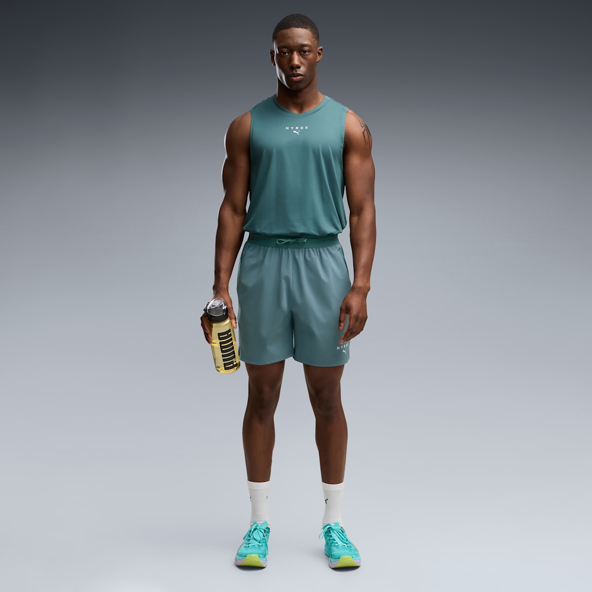 PUMA x HYROX PWRTRAIN 7" Shorts Men - Herb Garden - on model