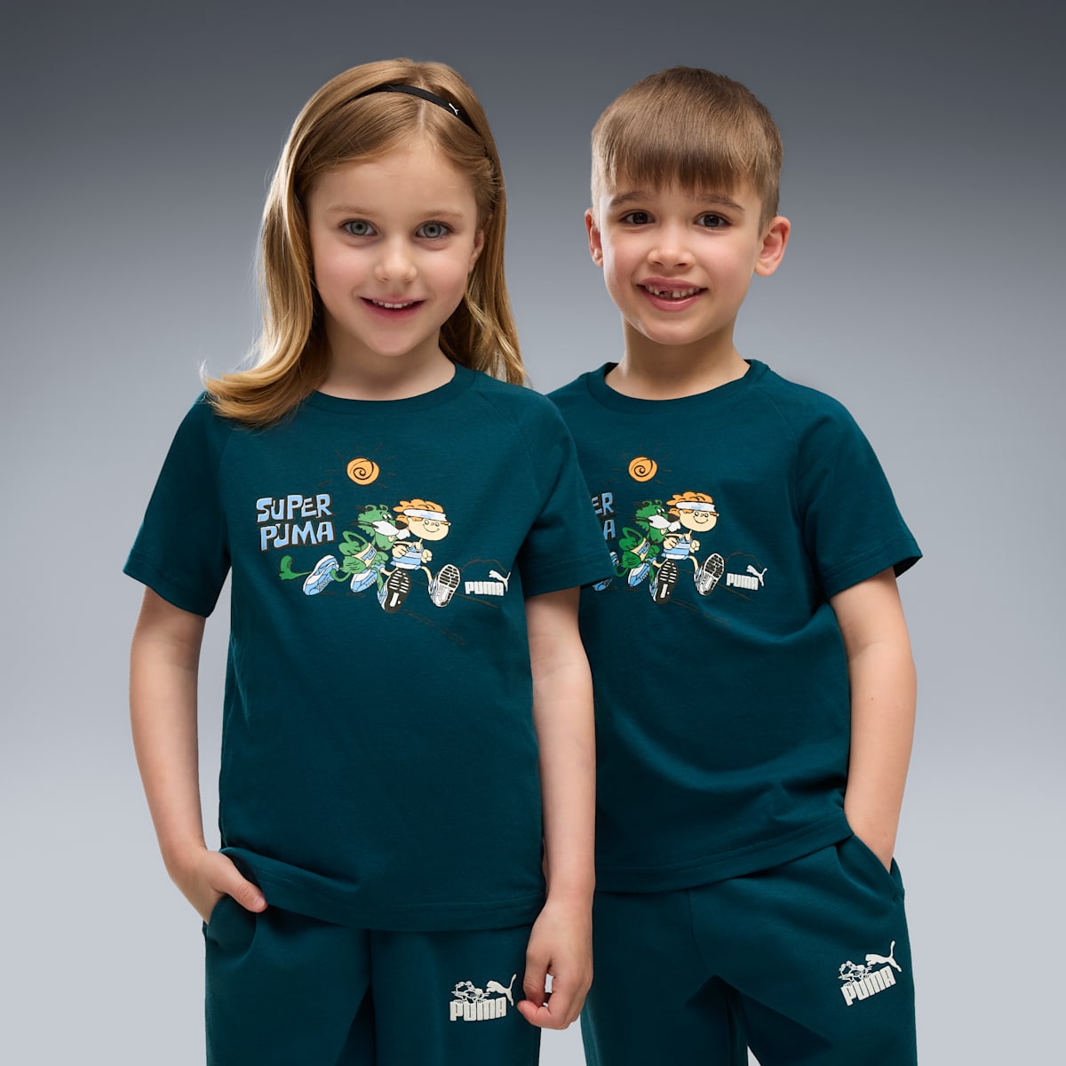 PUMA Kids Graphic Tee - Midnight Petrol - on model