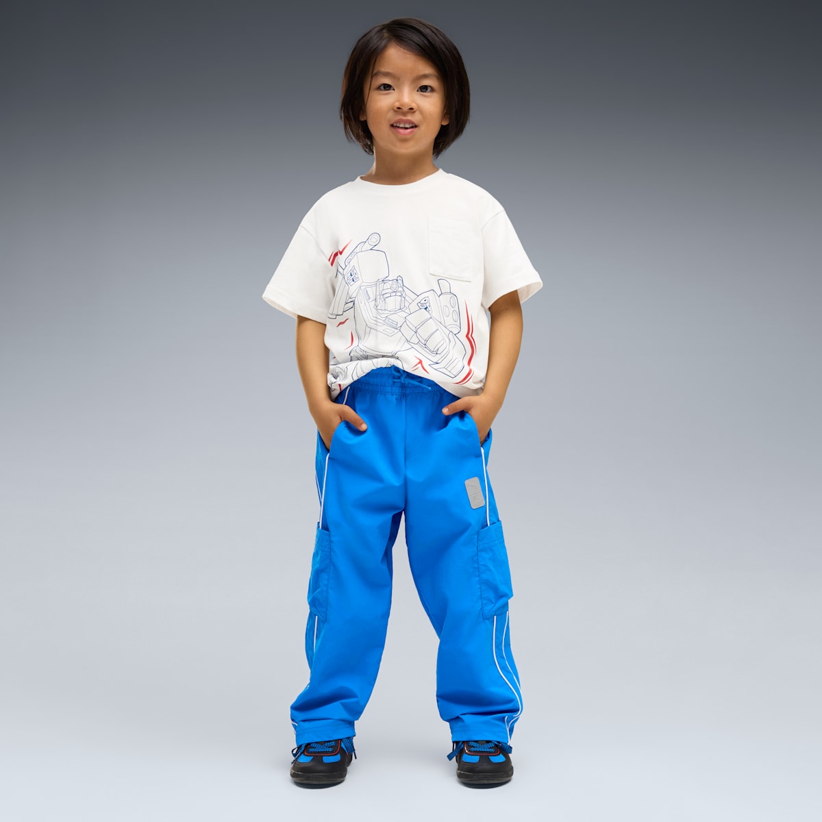 PUMA x TRANSFORMERS T7 Relaxed Cargo Pants Kids - Racing Blue - on model