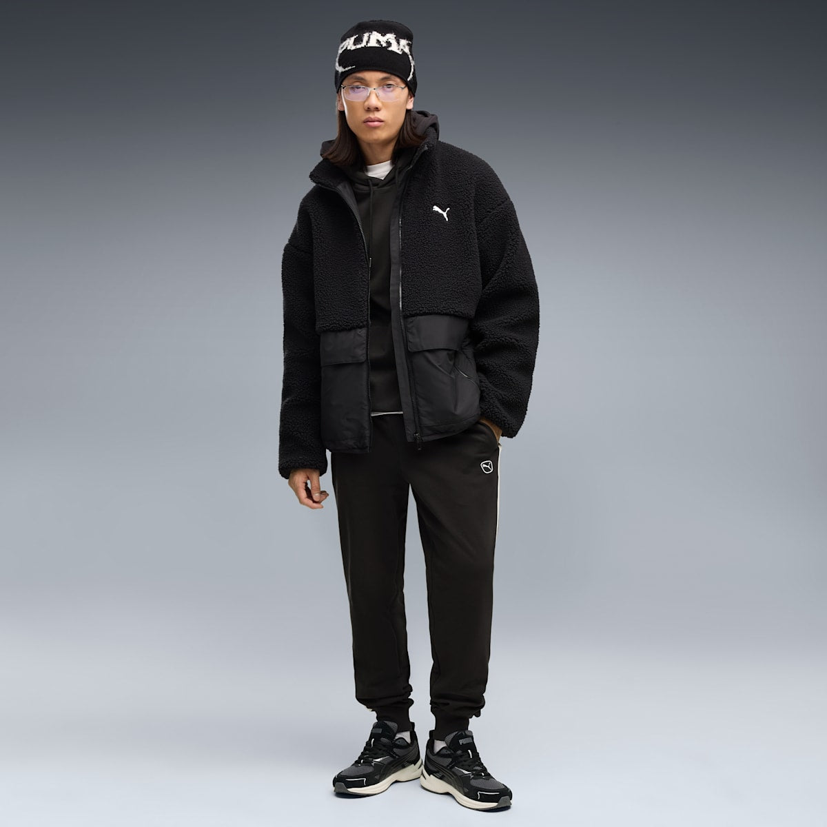 Essentials Elevated Men's Sweatpants - PUMA Black-warm white - on model