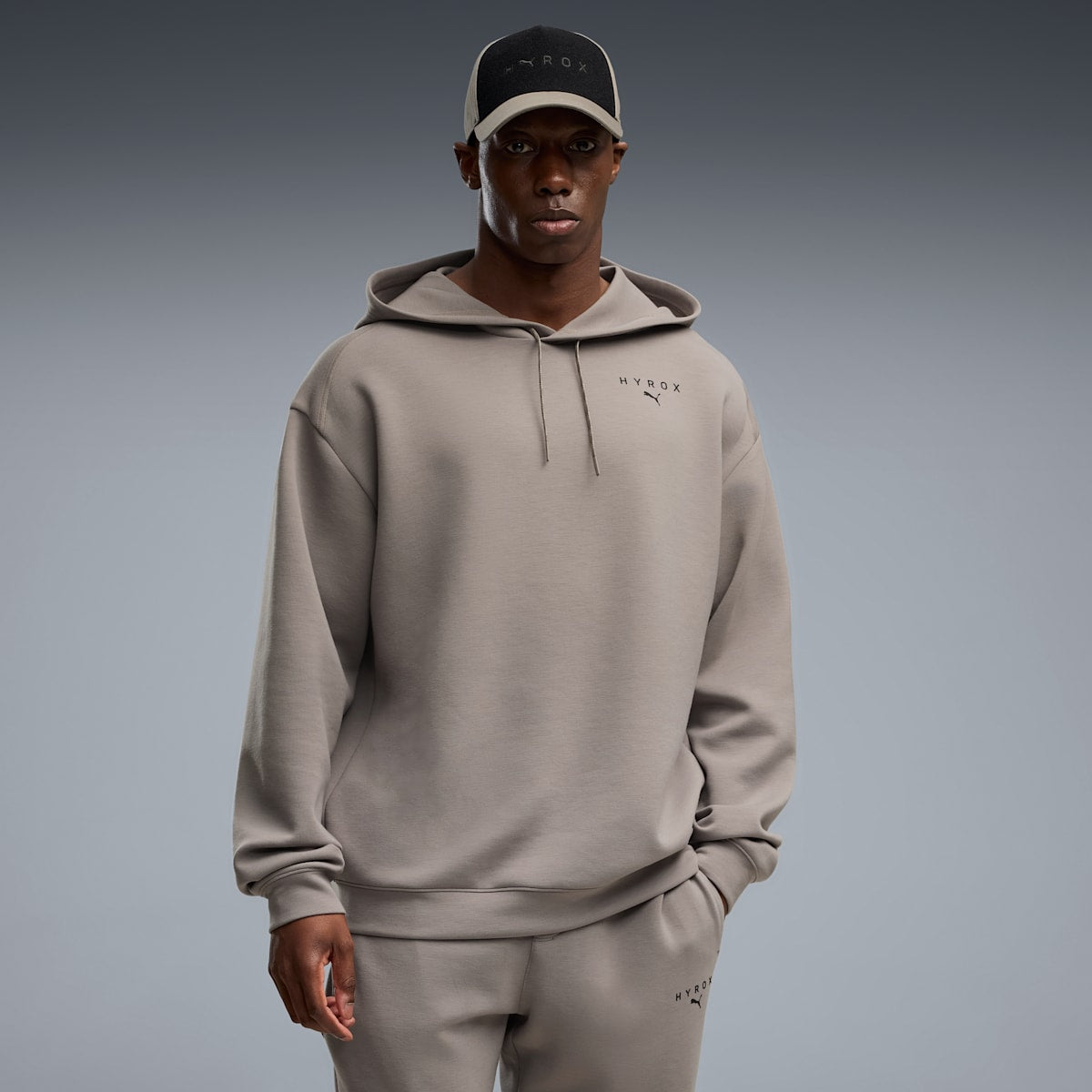 PUMA x HYROX CLOUDSPUN Hoodie Men - Mouse Gray - on model