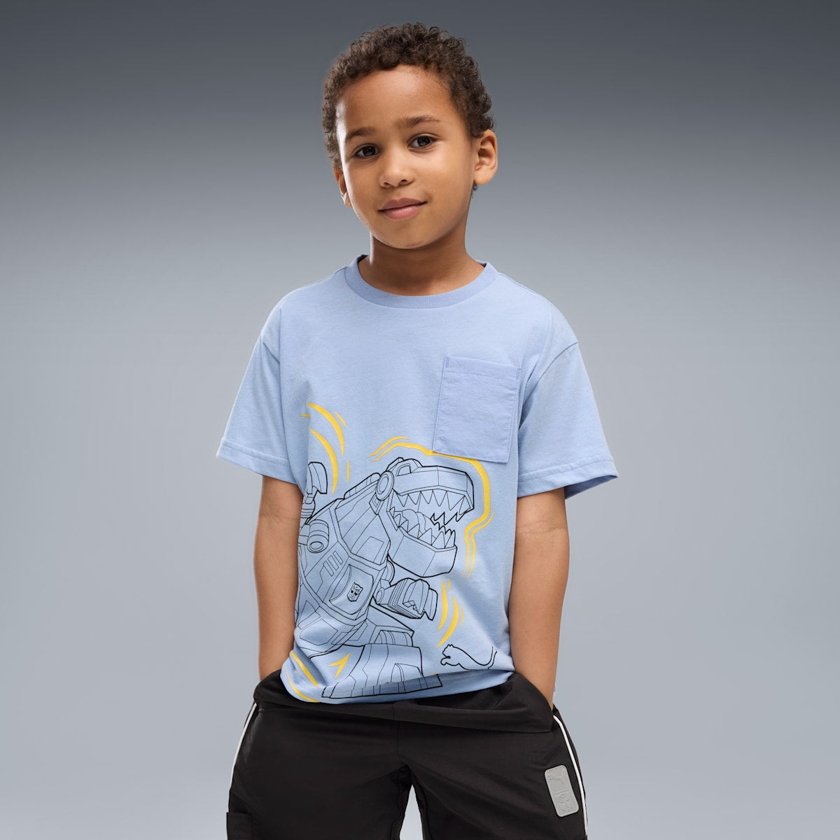 PUMA x TRANSFORMERS Little Kids' Relaxed Graphic Tee - Chambray Blue - on model