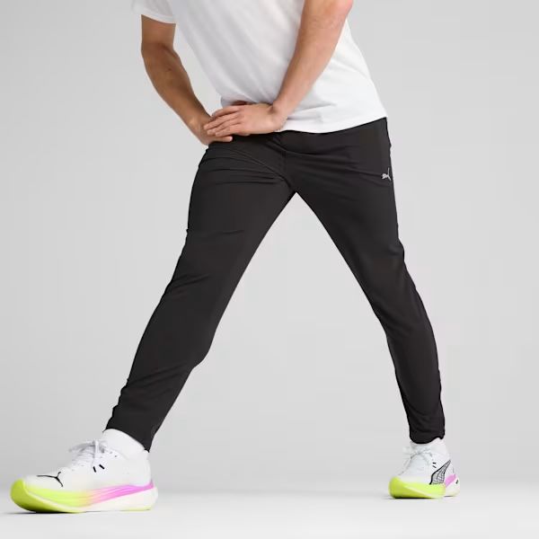 RUN VELOCITY Tapered Pants Men - PUMA Black model view